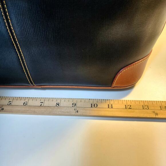 Dooney & Bourke Saffiano Tassel Bucket Tote Bag in black with tan trim - Picture 6 of 16